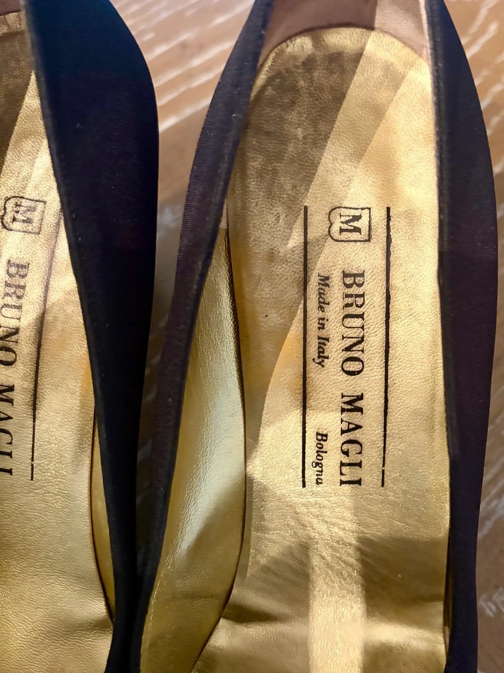 Bruno Magli Black Pointed Toe Flat with Gold Insole